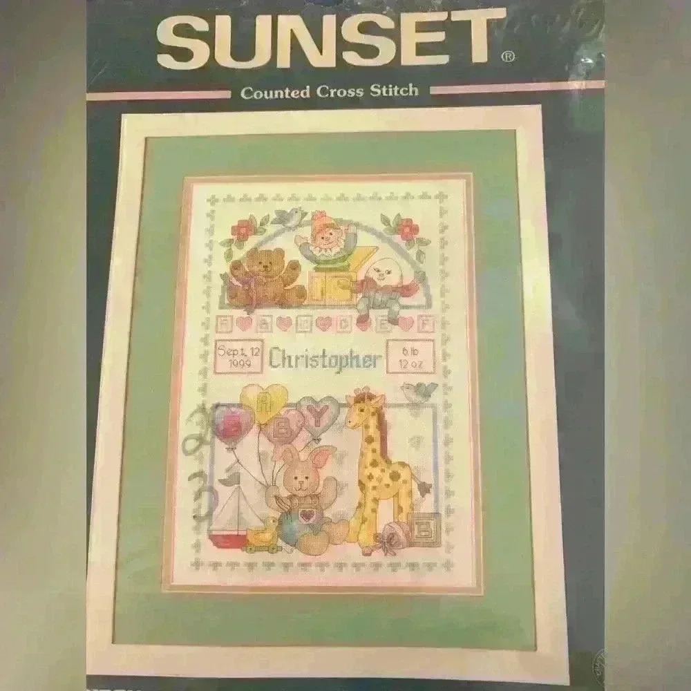 Sunset Counted cross stitch birth records for baby design by Ann Craig 1998